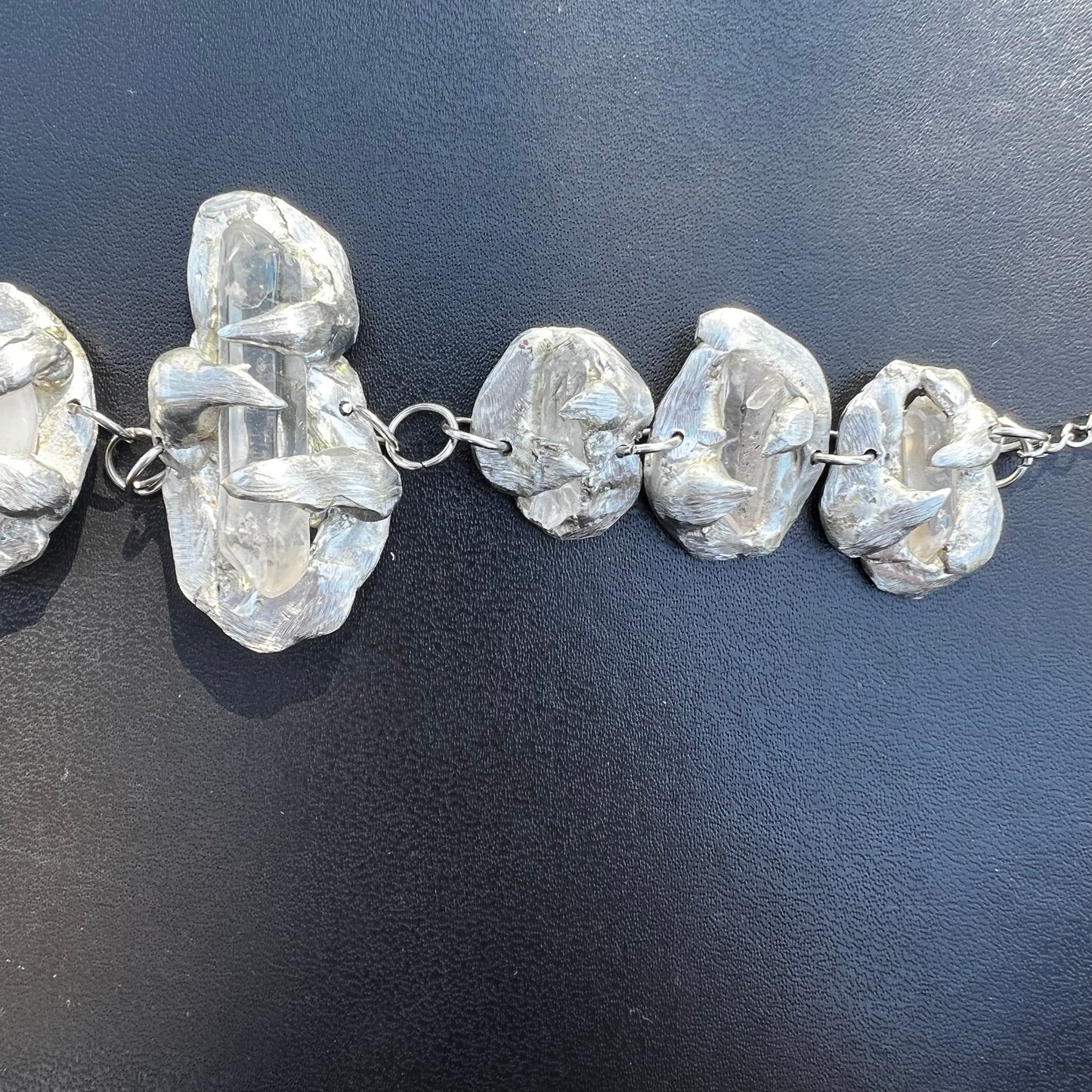 a Held By The Universe Necklace