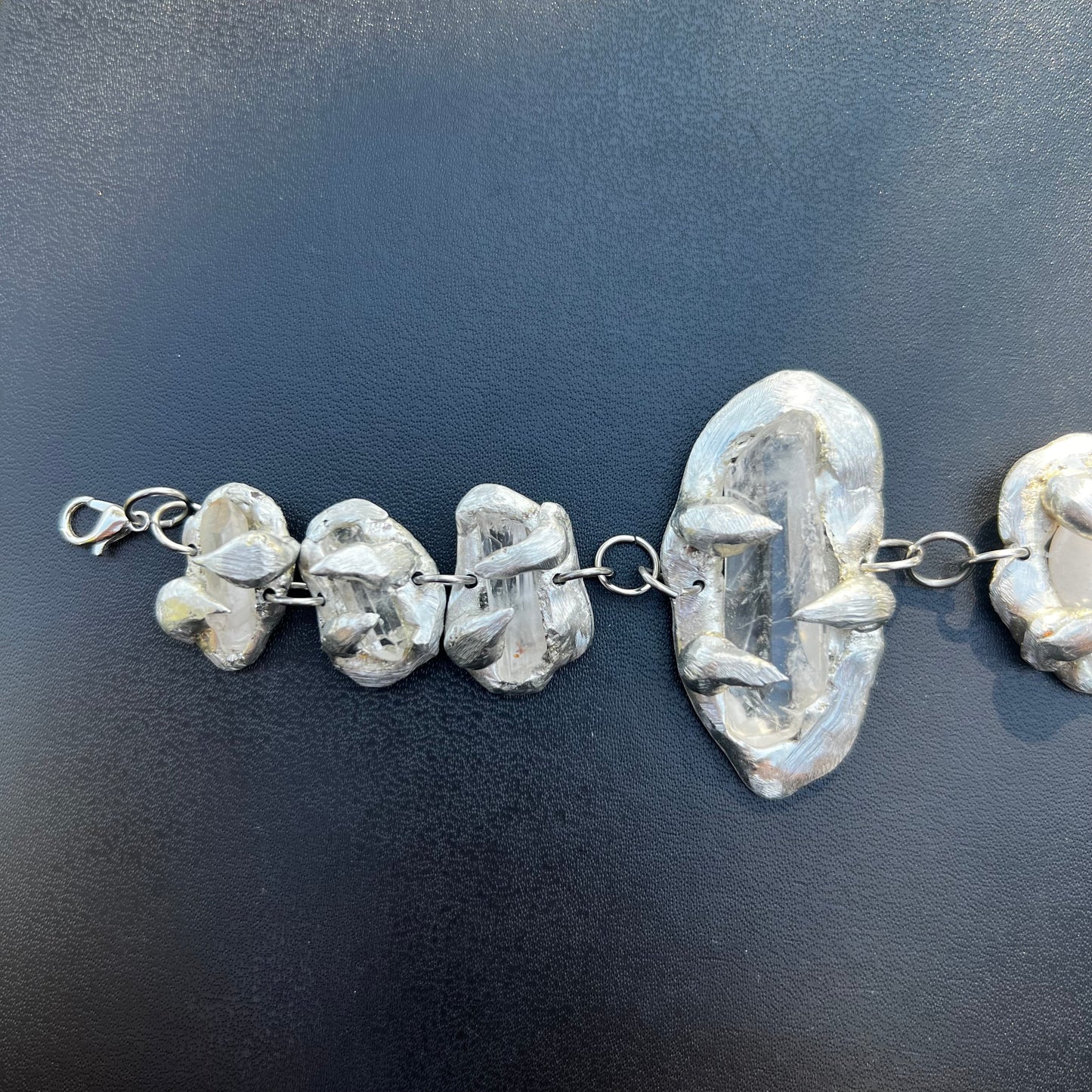 a Held By The Universe Necklace