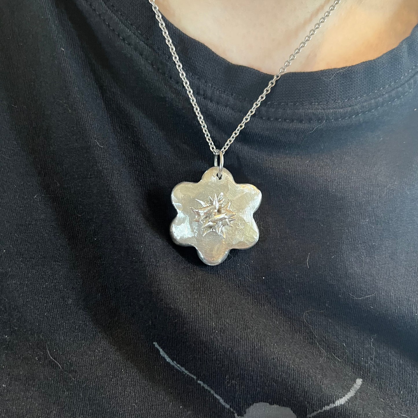 a Protect Your Heart Flower Necklace