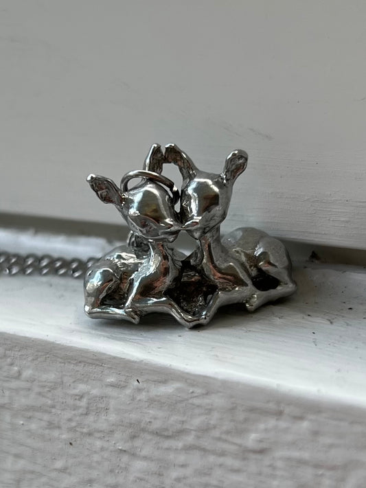 angel fawns kissing